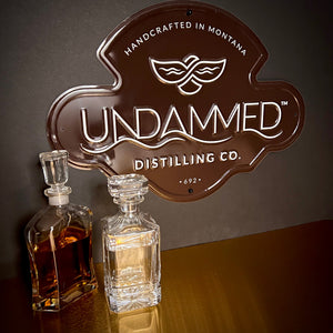 Undammed Distilling Co Tin Tacker