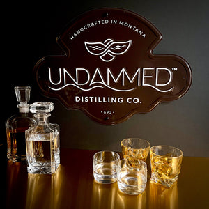 Undammed Distilling Co Tin Tacker