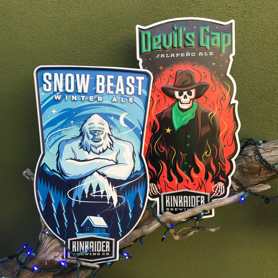 The Kinkaider Duo: Set of 2 Devil's Gap and Snow Beast Tin Tacker Metal Beer Signs