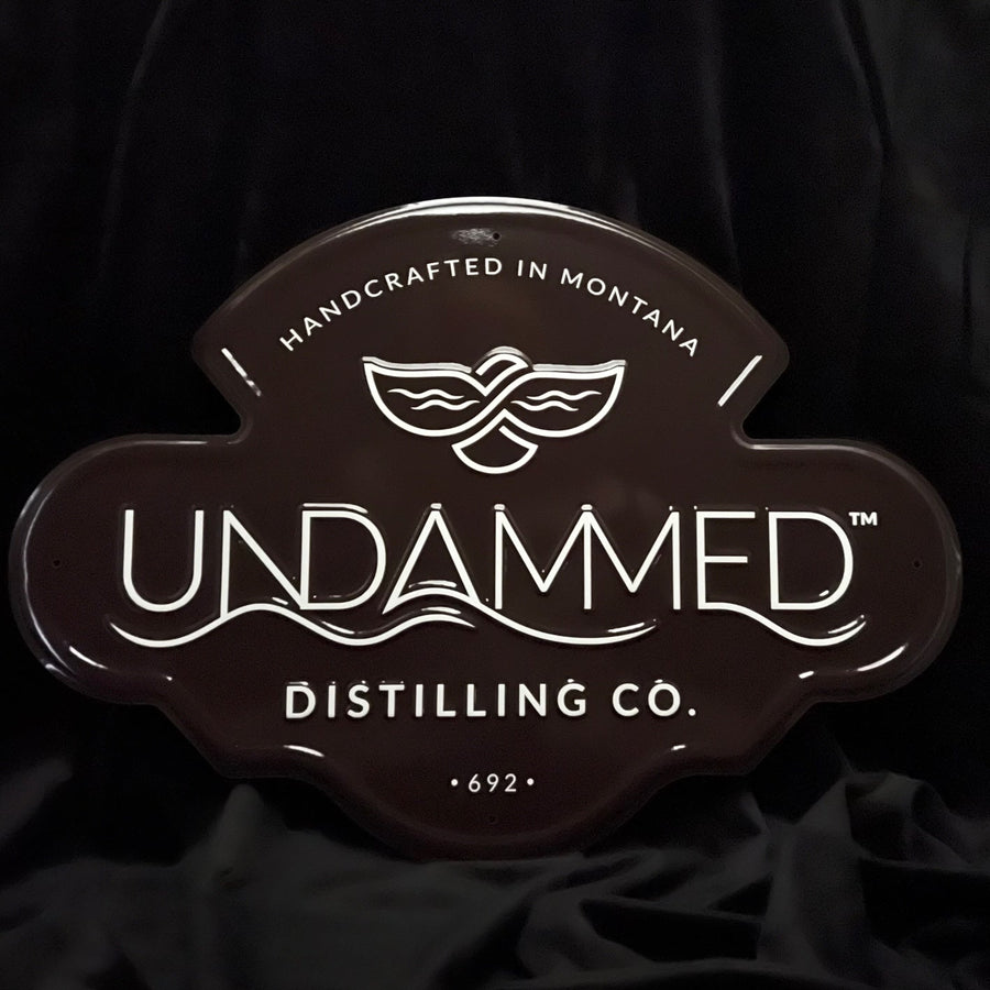 Undammed Distilling Co Tin Tacker